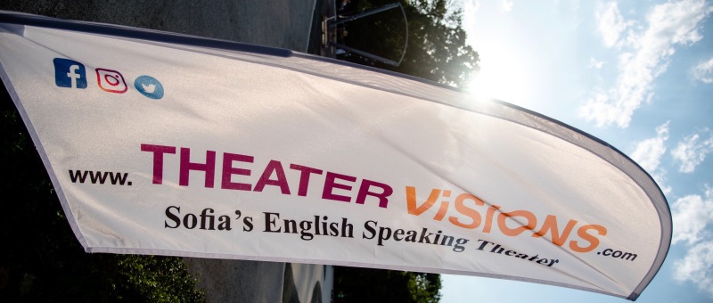Theater Visions flag rotated to side